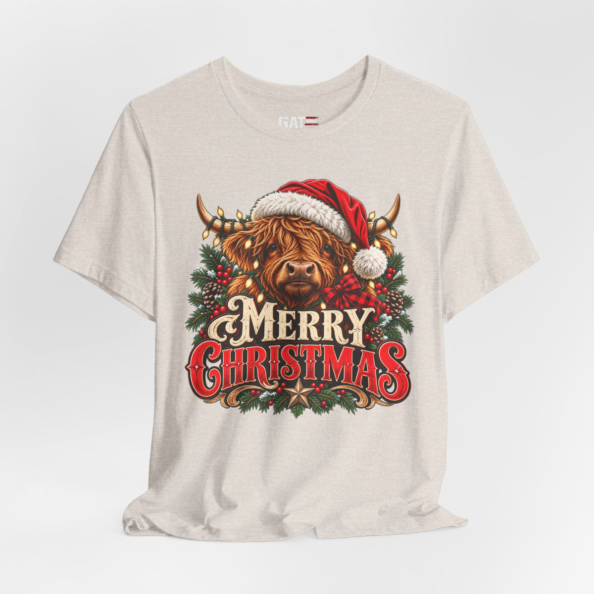 light beige Highland cow Santa hat Merry Christmas graphic T-shirt, styled front view