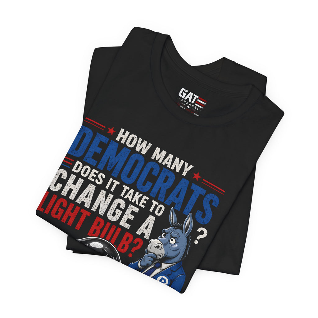 Political Humor T‑Shirt — “How Many Democrats…” Light Bulb Joke Tee