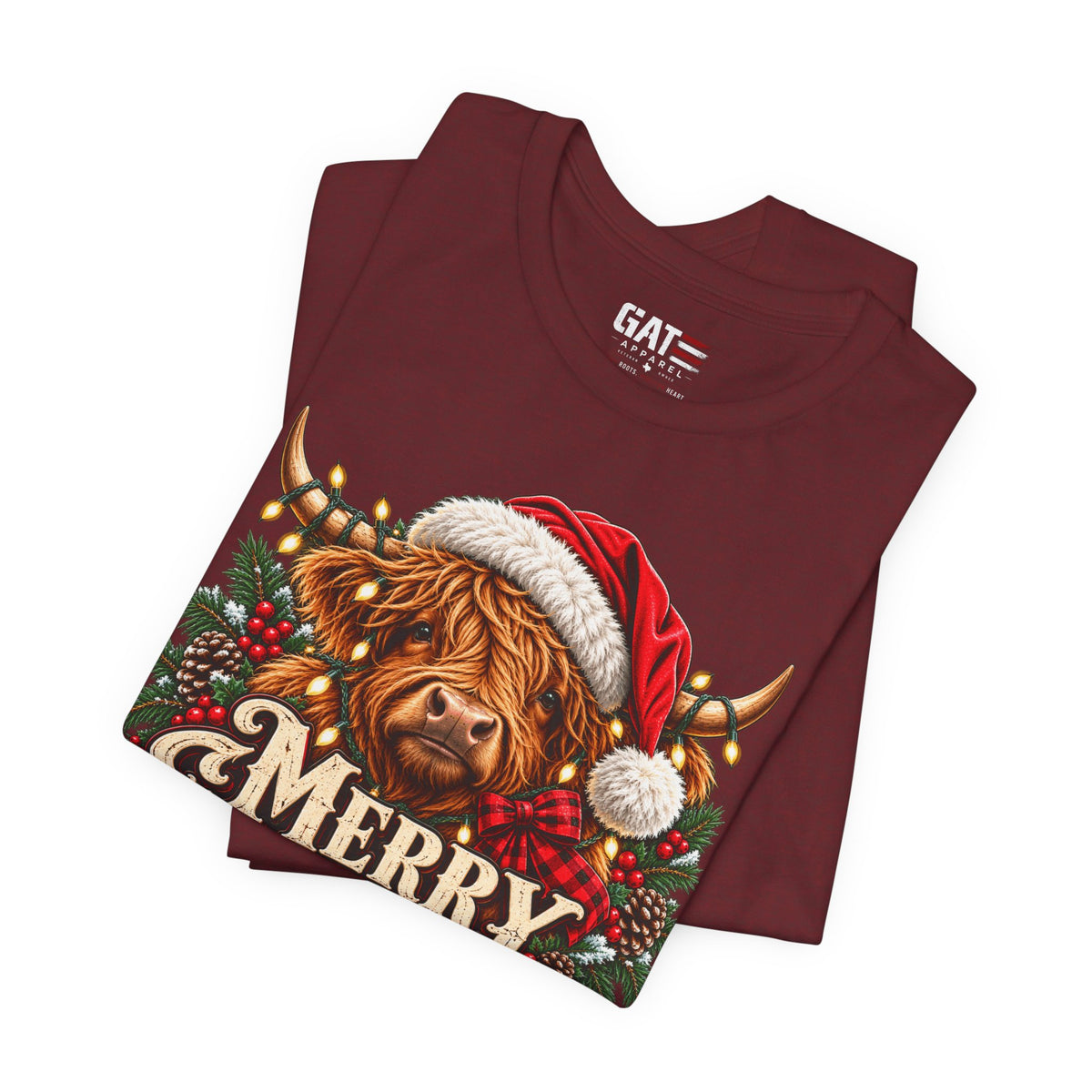 Folded burgundy Highland cow Santa hat Merry Christmas graphic T-shirt, print close-up