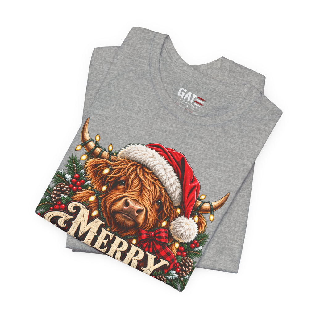 Folded heather grey Highland cow Santa hat Merry Christmas graphic T-shirt, print close-up