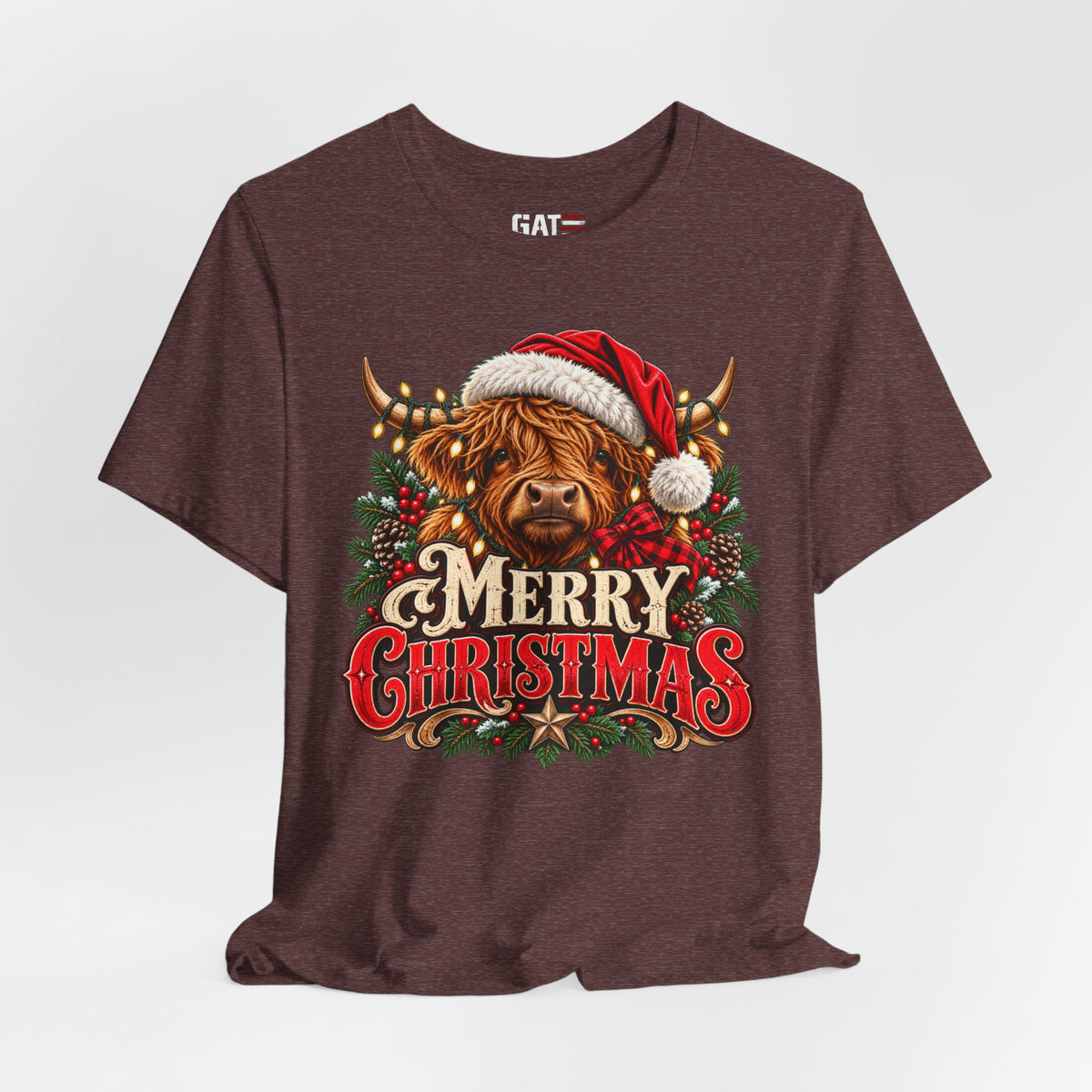 brown Highland cow Santa hat Merry Christmas graphic T-shirt, styled front view