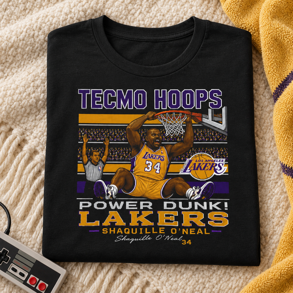 Los Angeles Lakers – Shaquille O'Neal – Tecmo Hoops Shirt | Retro Basketball Tee — folded lifestyle mockup with upper-chest graphic