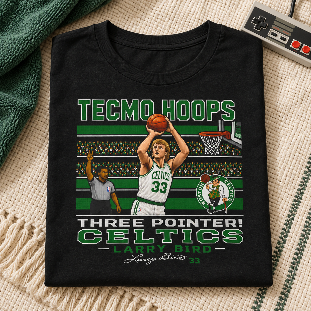 Boston Celtics – Larry Bird – Tecmo Hoops Shirt | Retro Basketball Tee — folded lifestyle mockup with upper-chest graphic
