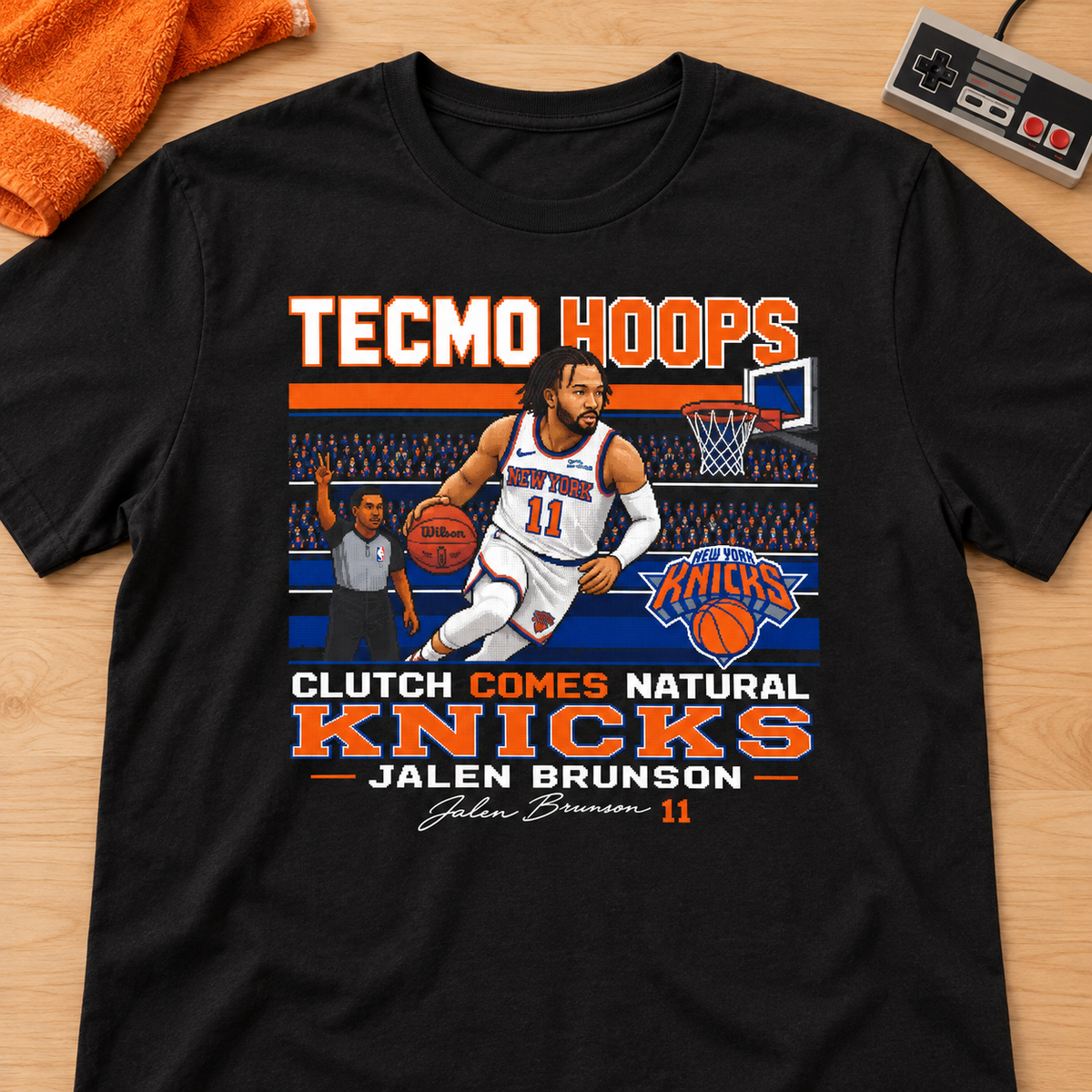 New York Knicks – Jalen Brunson – Tecmo Hoops Shirt | Retro Basketball Tee — lay-flat lifestyle mockup with upper-chest graphic