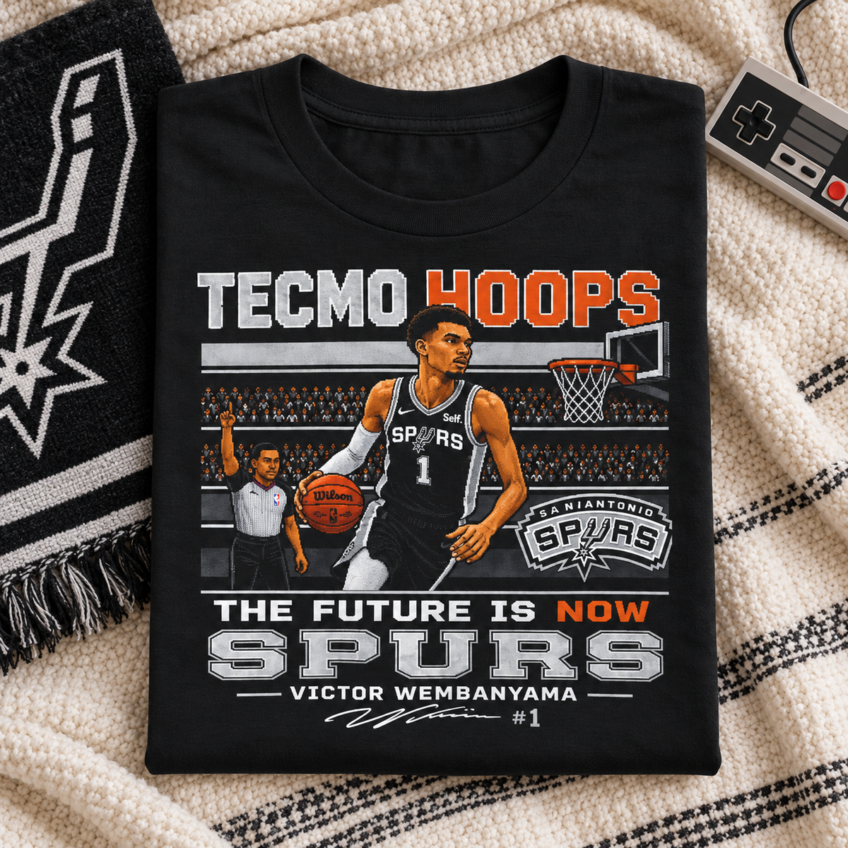 San Antonio Spurs – Victor Wembanyama – Tecmo Hoops Shirt | Retro Basketball Tee — folded lifestyle mockup with upper-chest graphic