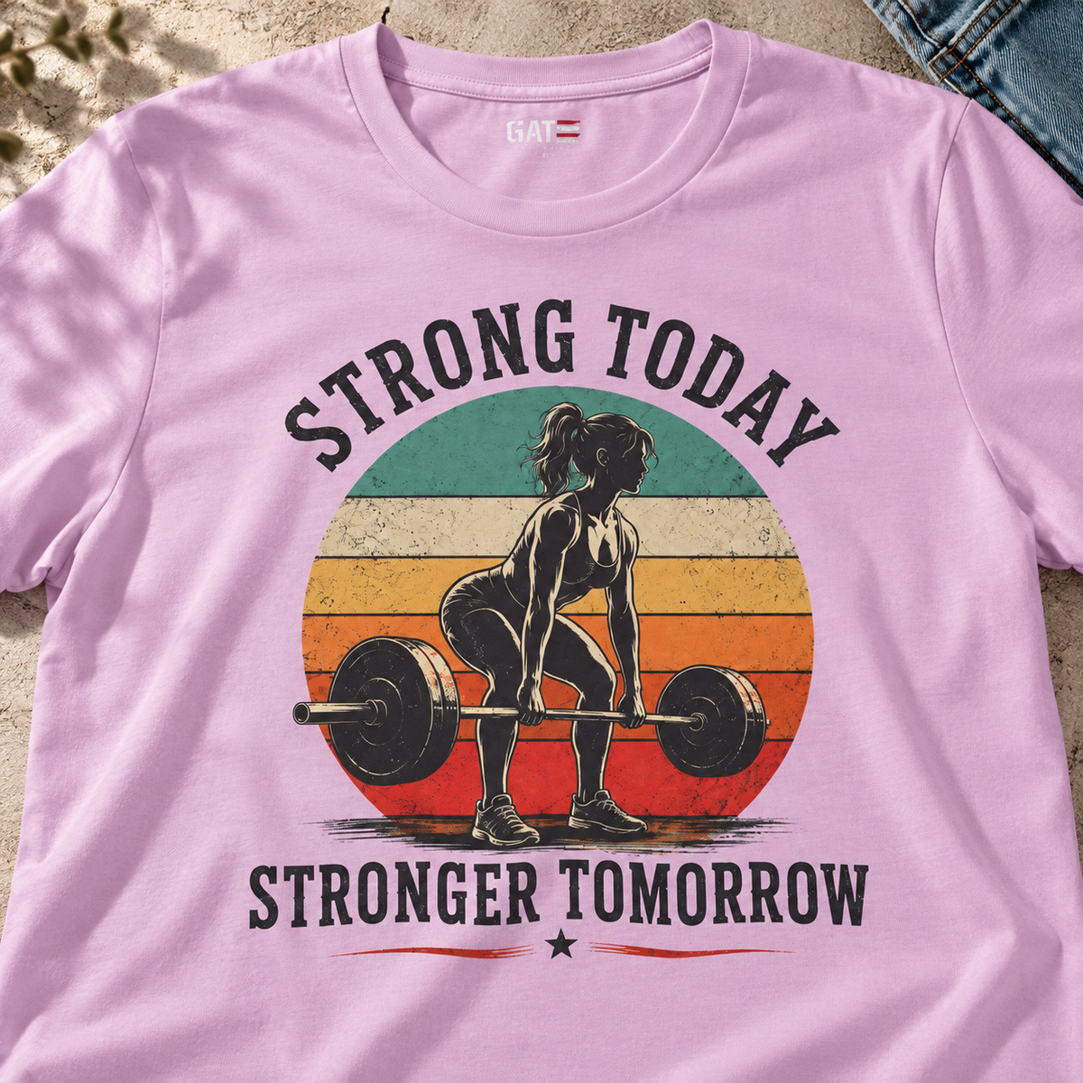 Strong Today Stronger Tomorrow Weightlifting Shirt — close-up lifestyle flat lay