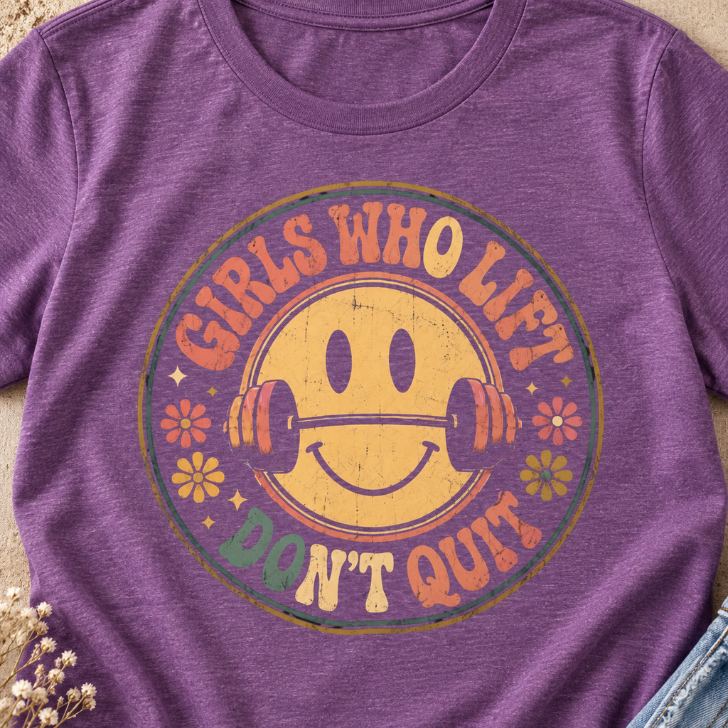 Girls Who Lift Don't Quit Gym Shirt | Retro Smiley Tee — close-up lifestyle flat lay
