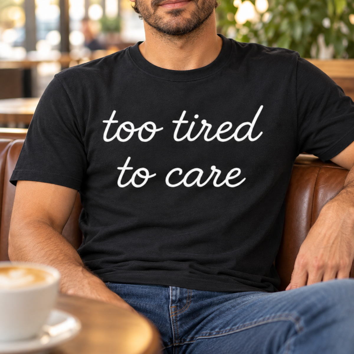 Too Tired to Care Shirt | Funny Introvert Tee — close-up lifestyle mockup