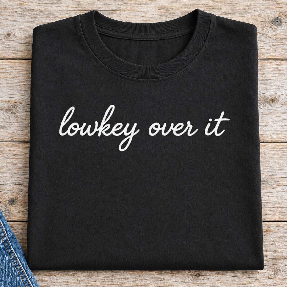 Lowkey Over It Shirt | Funny Gen Z Tee — folded shirt with original artwork