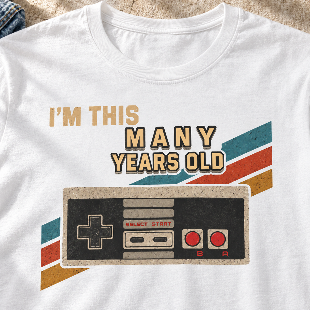 Retro Gamer Birthday Shirt | I'm This Many Years Old Tee — close-up lifestyle flat lay