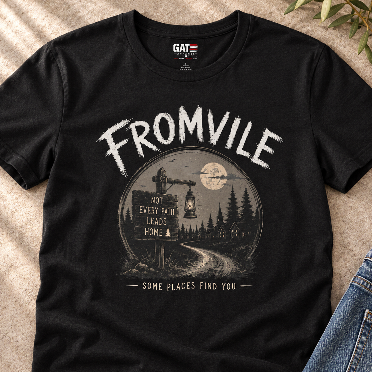 Fromville Some Places Find You Shirt | Scenic Horror Tee — close-up lifestyle flat lay