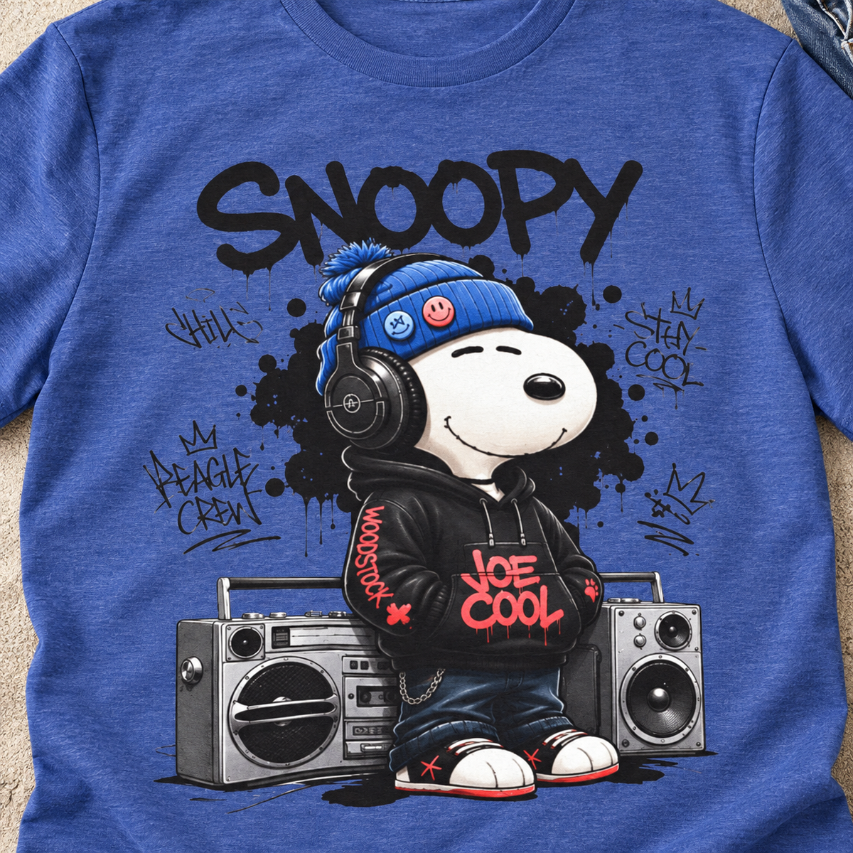 Snoopy Joe Cool Hip-Hop T-Shirt — close-up lifestyle flat lay