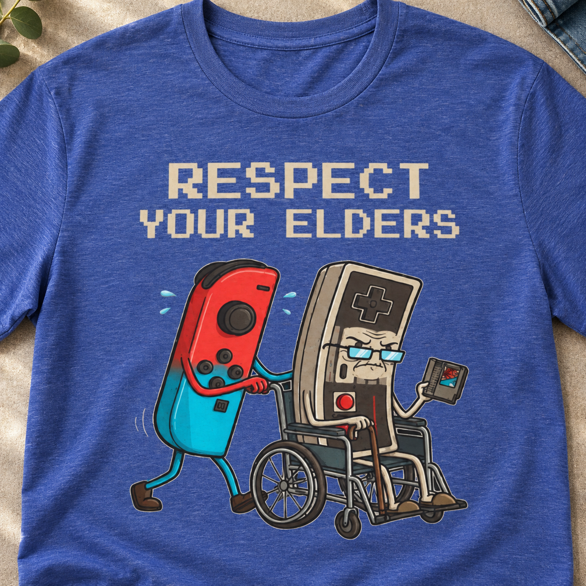 Respect Your Elders Retro Gaming T-Shirt — close-up lifestyle flat lay
