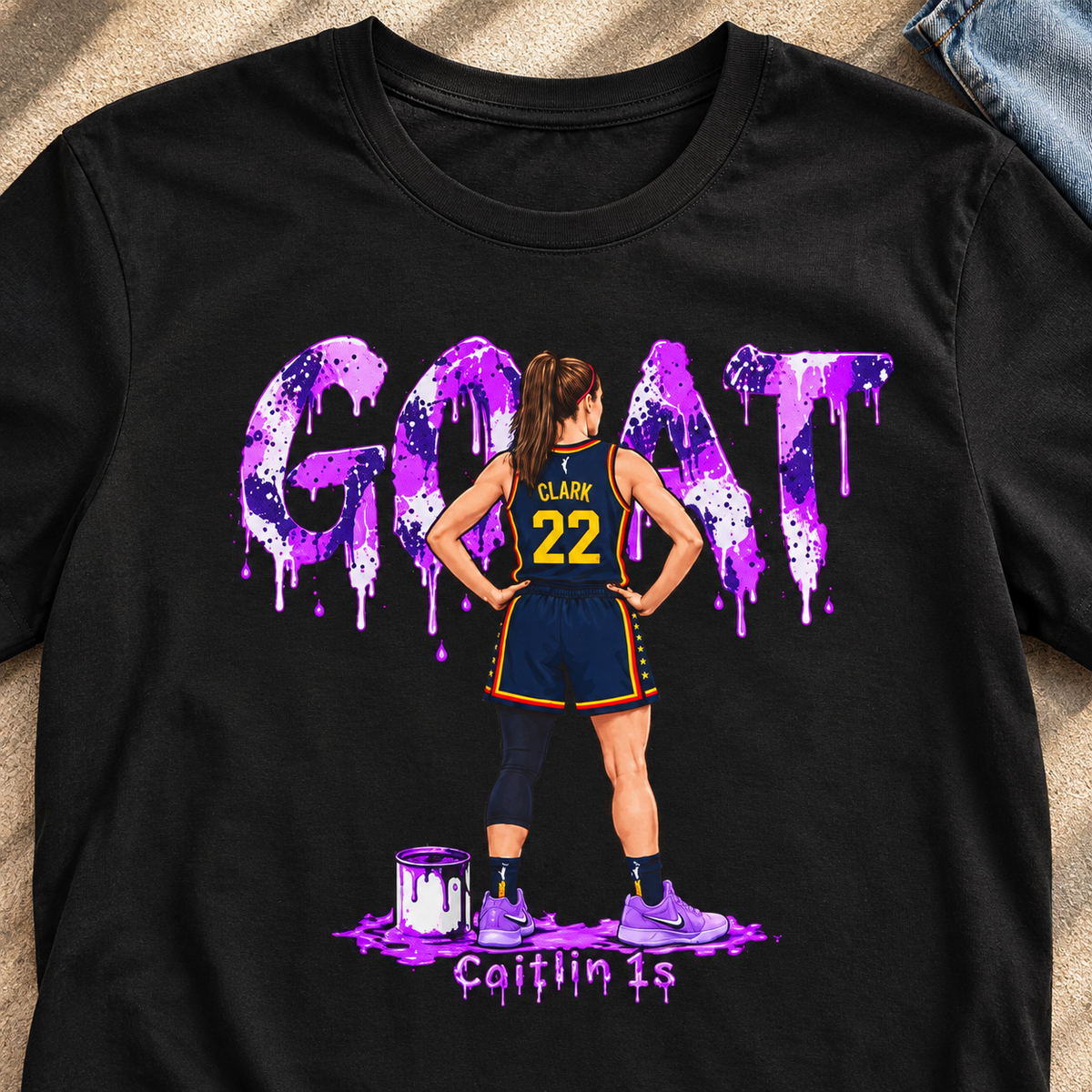Indiana Fever – Caitlin Clark – Caitlin 1s GOAT Purple Fade Sneaker T-Shirt — close-up lifestyle flat lay