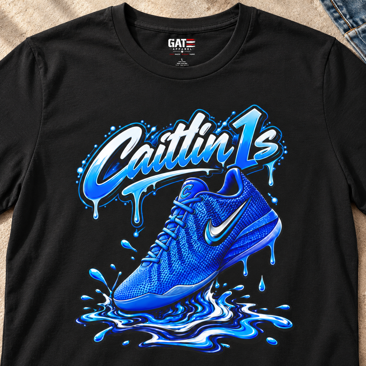 Indiana Fever – Caitlin Clark – Caitlin 1s Racer Blue Drip Sneaker T-Shirt — close-up lifestyle flat lay