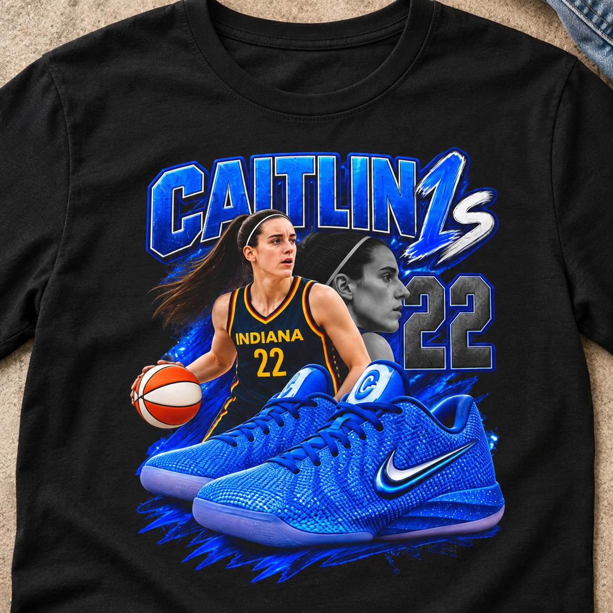 Indiana Fever – Caitlin Clark – Caitlin 1s Blue Racer Sneaker T-Shirt — close-up lifestyle flat lay