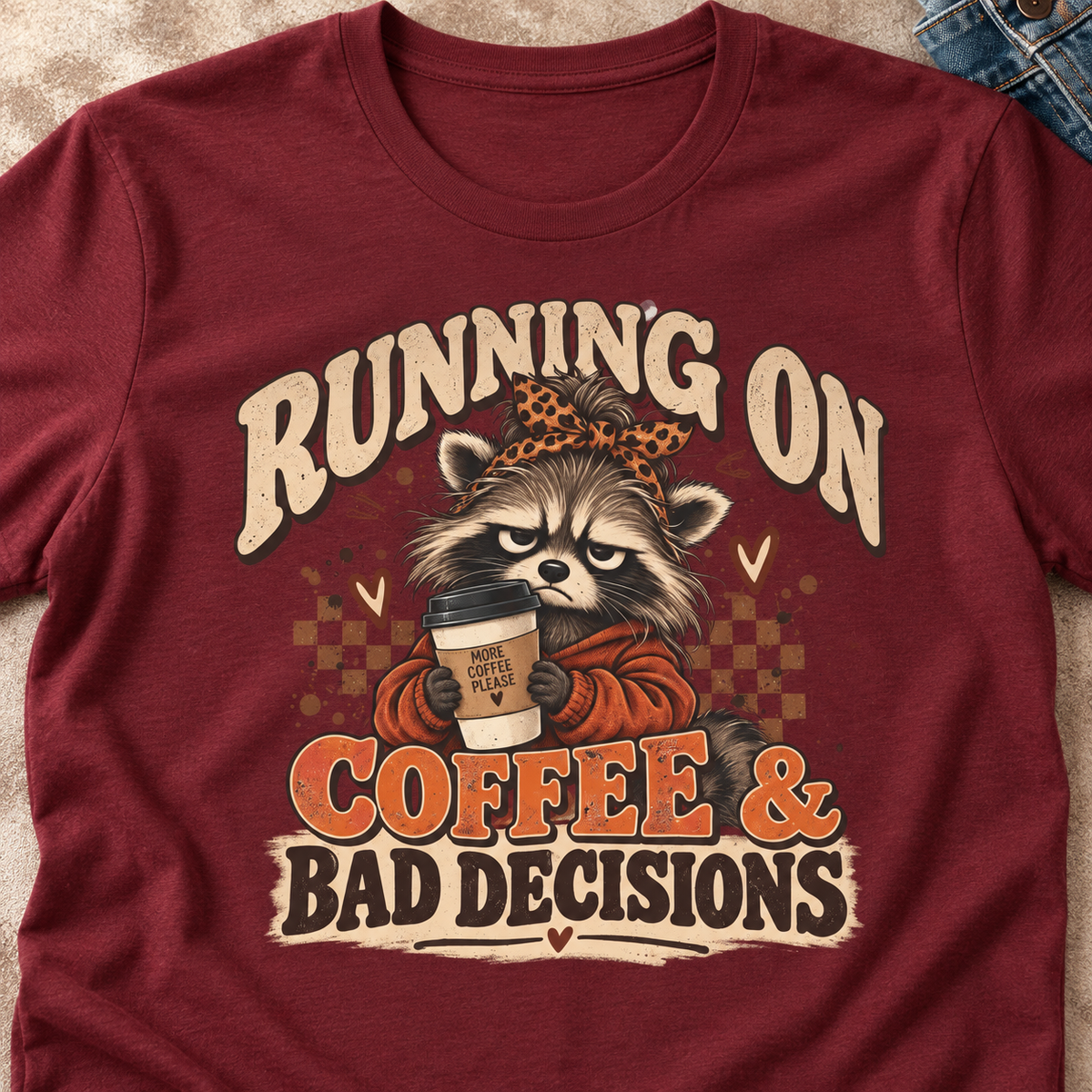 Running on Coffee & Bad Decisions Shirt | Funny Raccoon Tee — close-up lifestyle flat lay