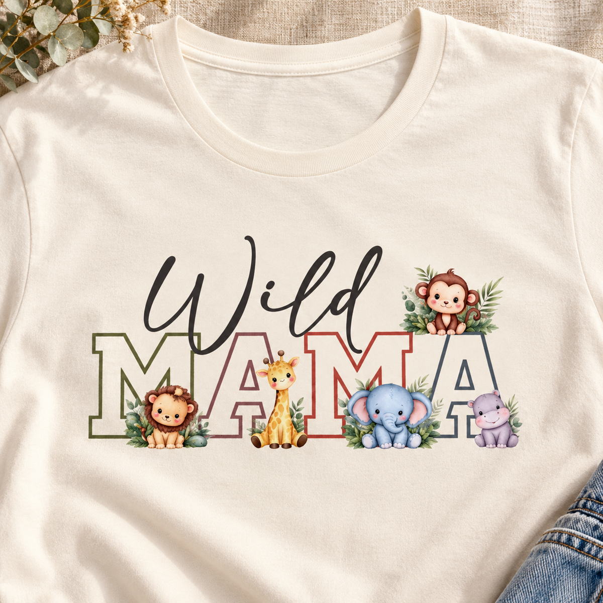 Wild Mama Tee — Cute Jungle Animal Mom Shirt — close-up lifestyle flat lay