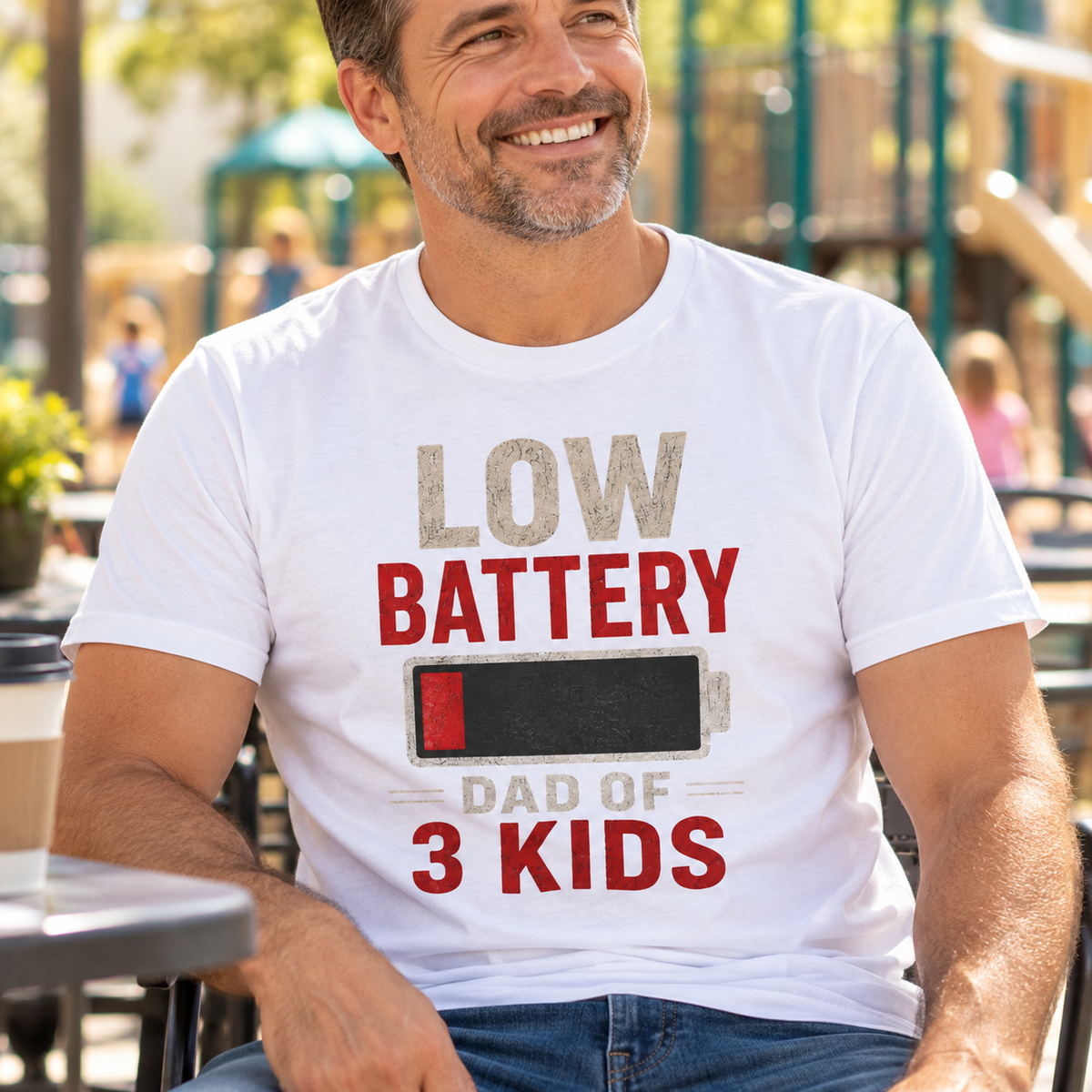 Low Battery Dad of 3 Kids Shirt | Funny Dad Tee — close-up lifestyle mockup worn by a man