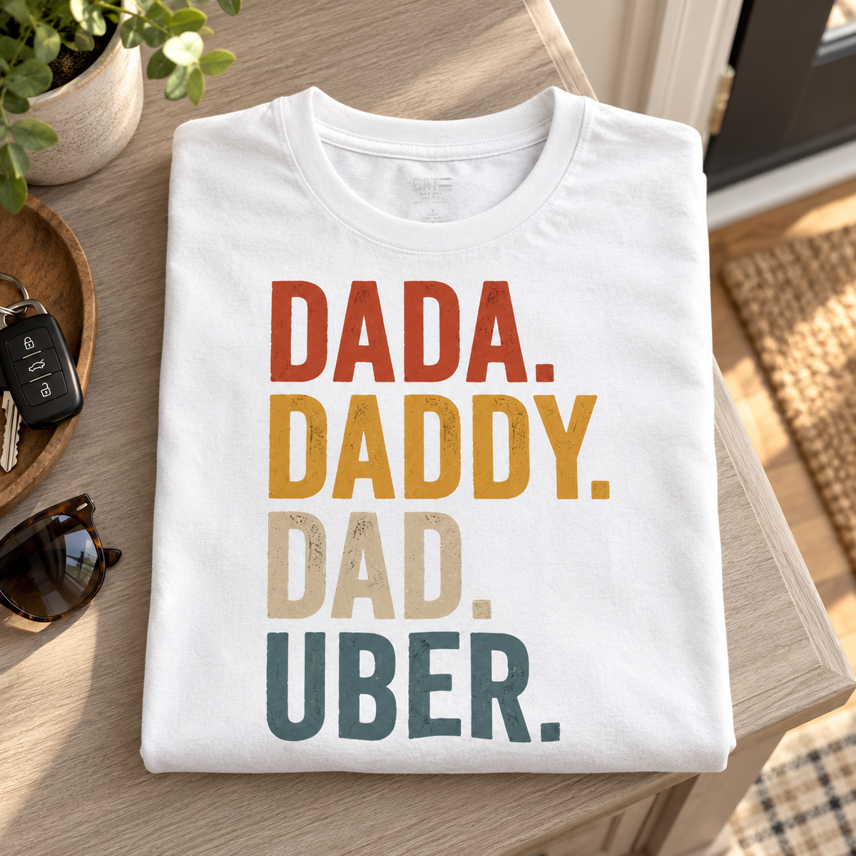 Dada Daddy Dad Uber Shirt | Funny Dad Life Tee — folded shirt lifestyle mockup