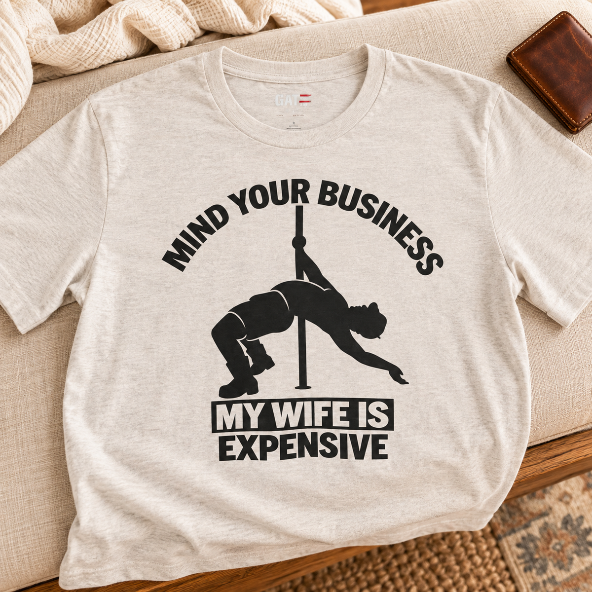 Mind Your Business "My Wife Is Expensive" Tee - Funny Pole Dancer Shirt — close-up lifestyle flat lay