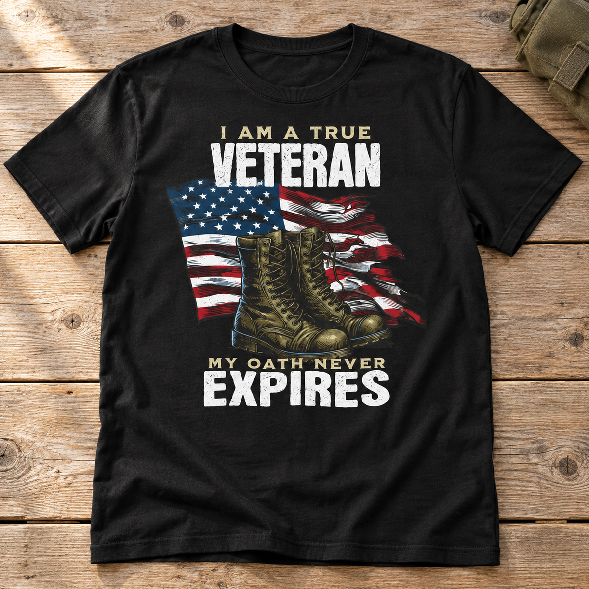 My Oath Never Expires veteran shirt with boots and American flag, black shirt flat lay