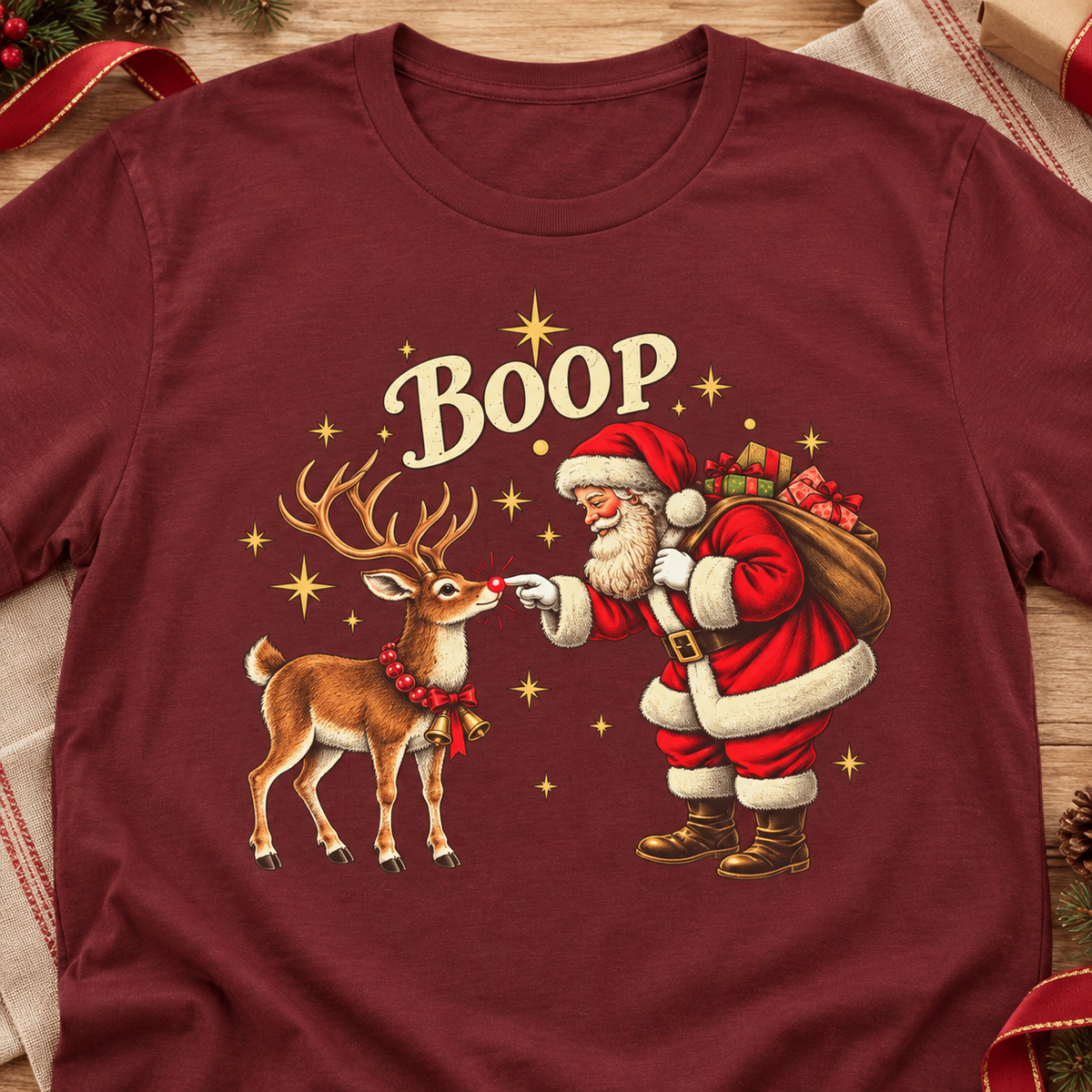 Santa and Reindeer Boop Christmas Graphic T-Shirt — layflat lifestyle mockup