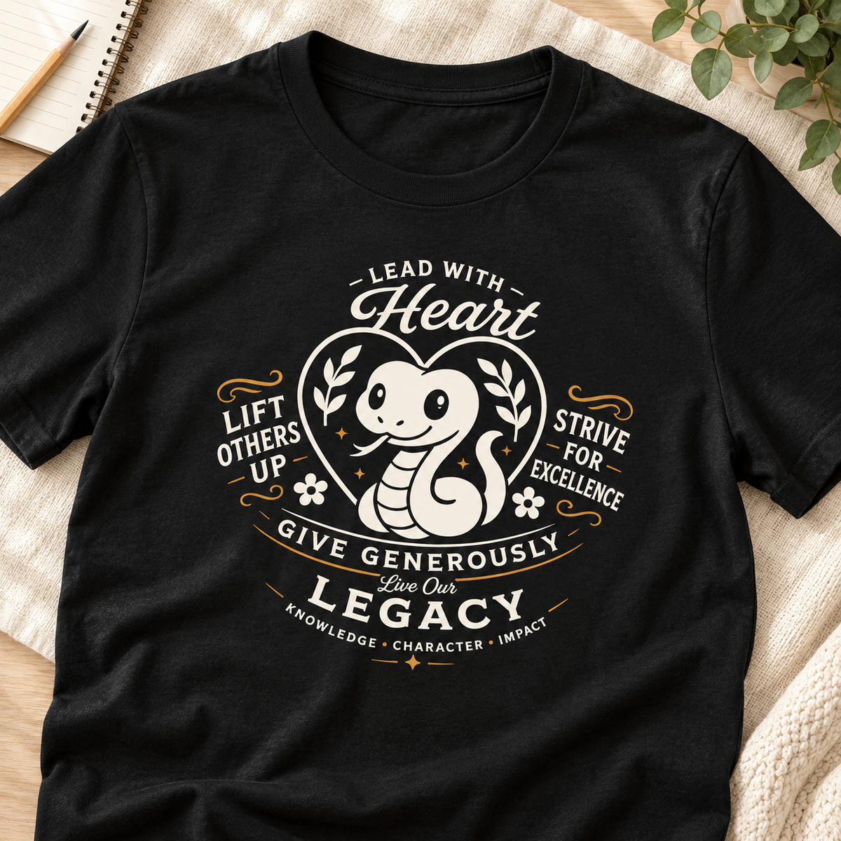 Ron Clark Altruismo Snake T-Shirt — layflat lifestyle mockup