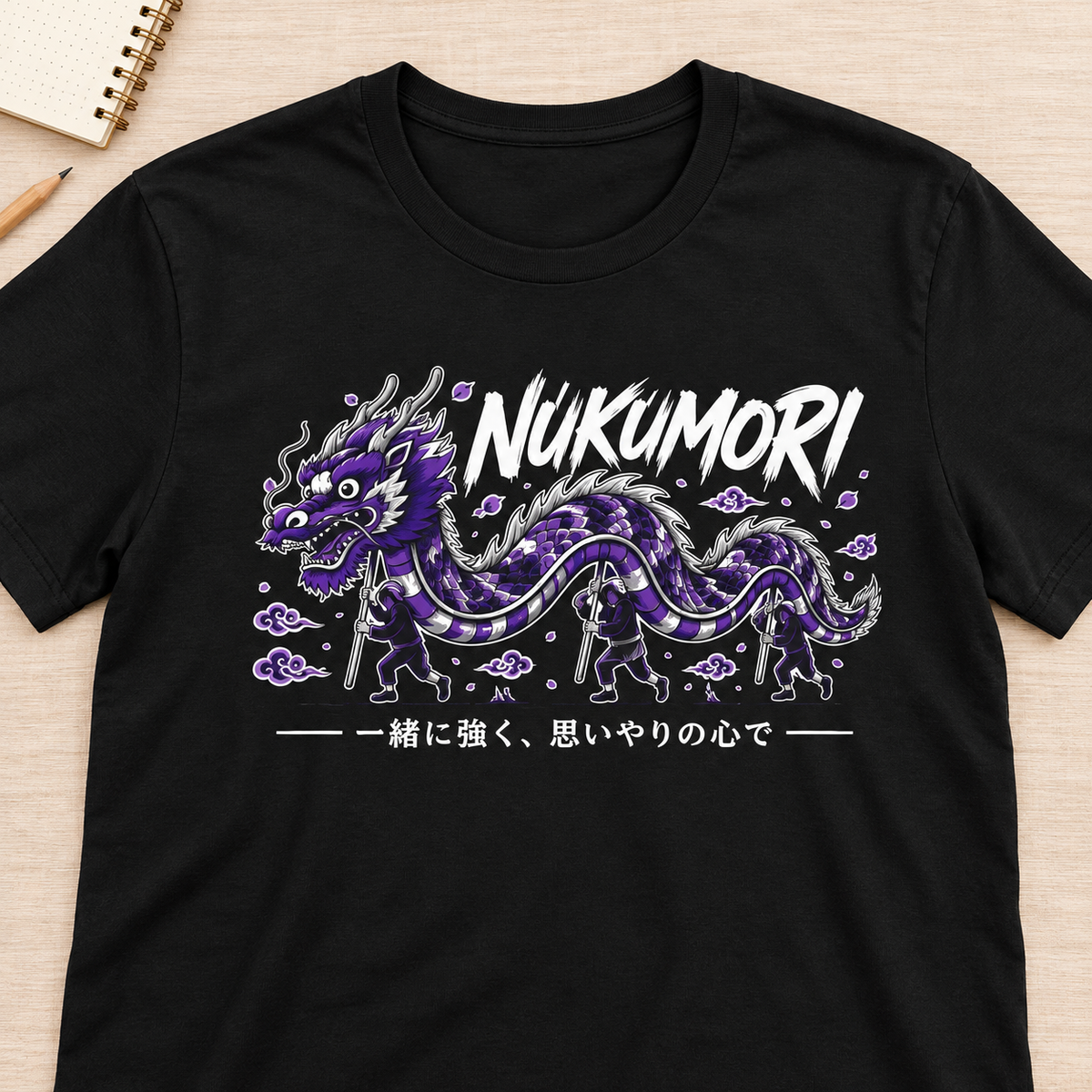 Ron Clark Nukumori Dragon T-Shirt — layflat lifestyle mockup