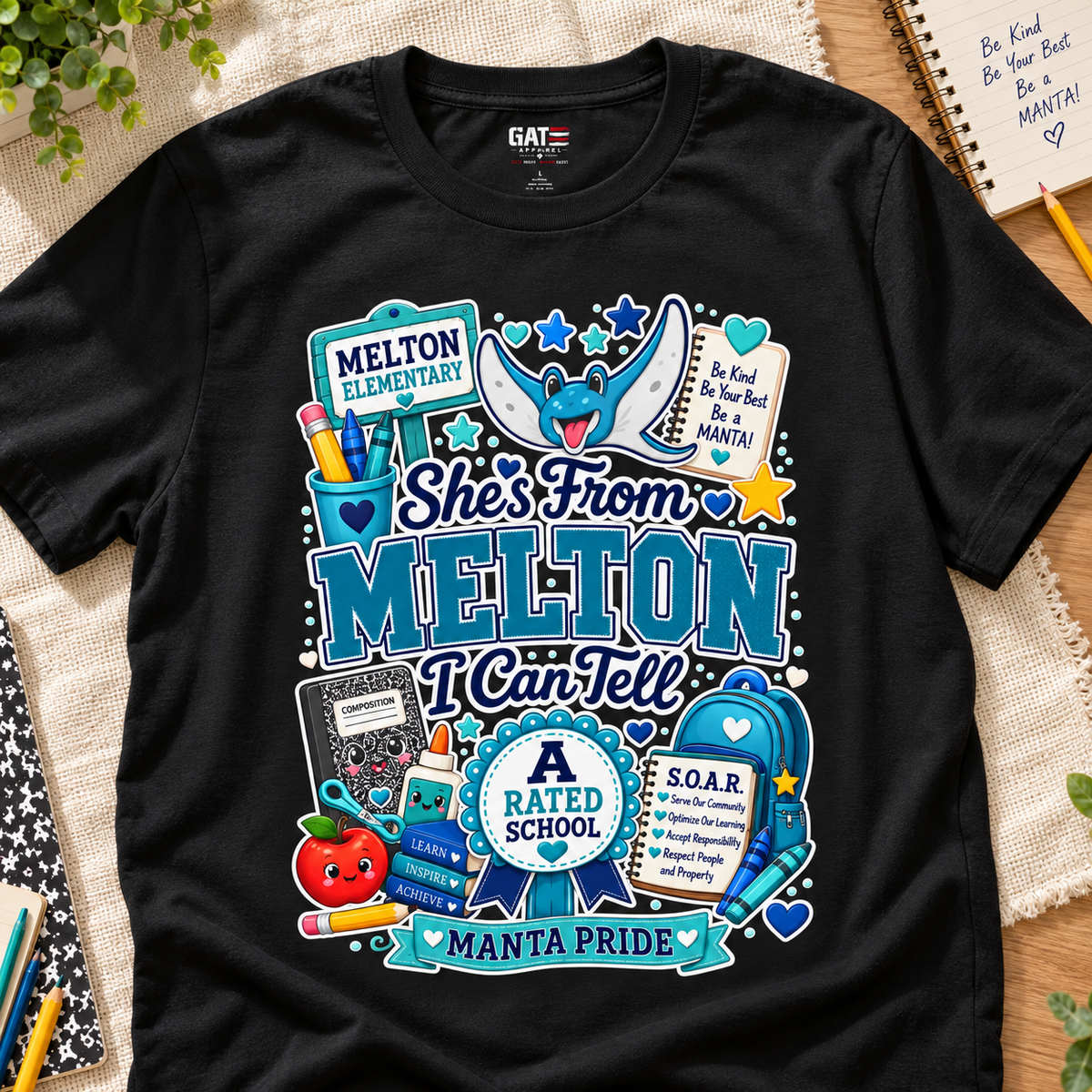 She’s From Melton Manta Pride T-Shirt — layflat lifestyle mockup