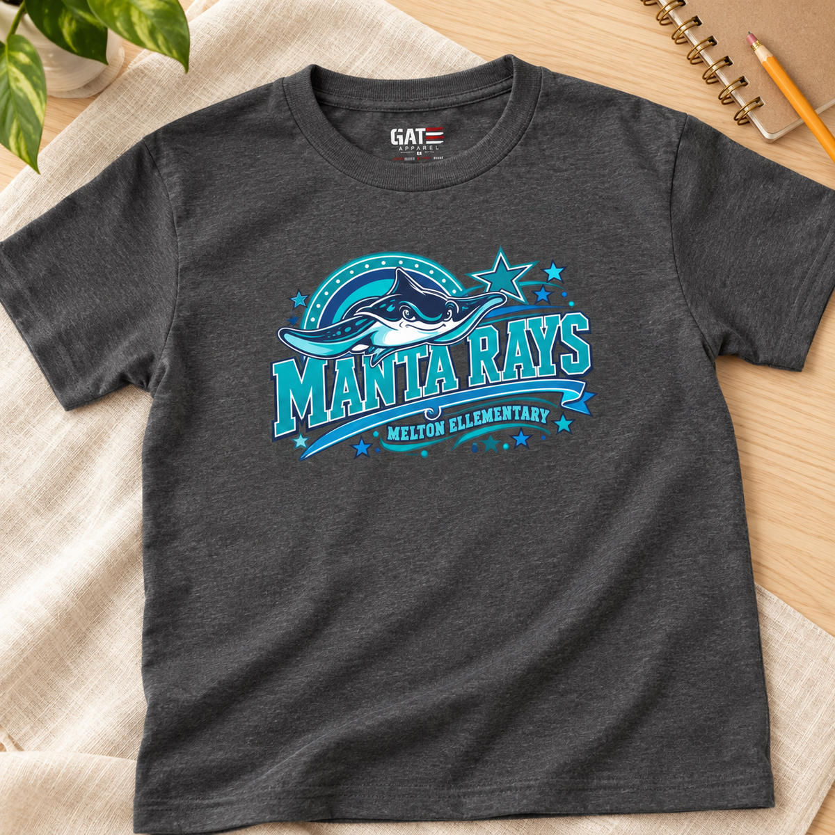 Melton Manta Rays Ocean Graphic Kids T-Shirt — layflat lifestyle mockup