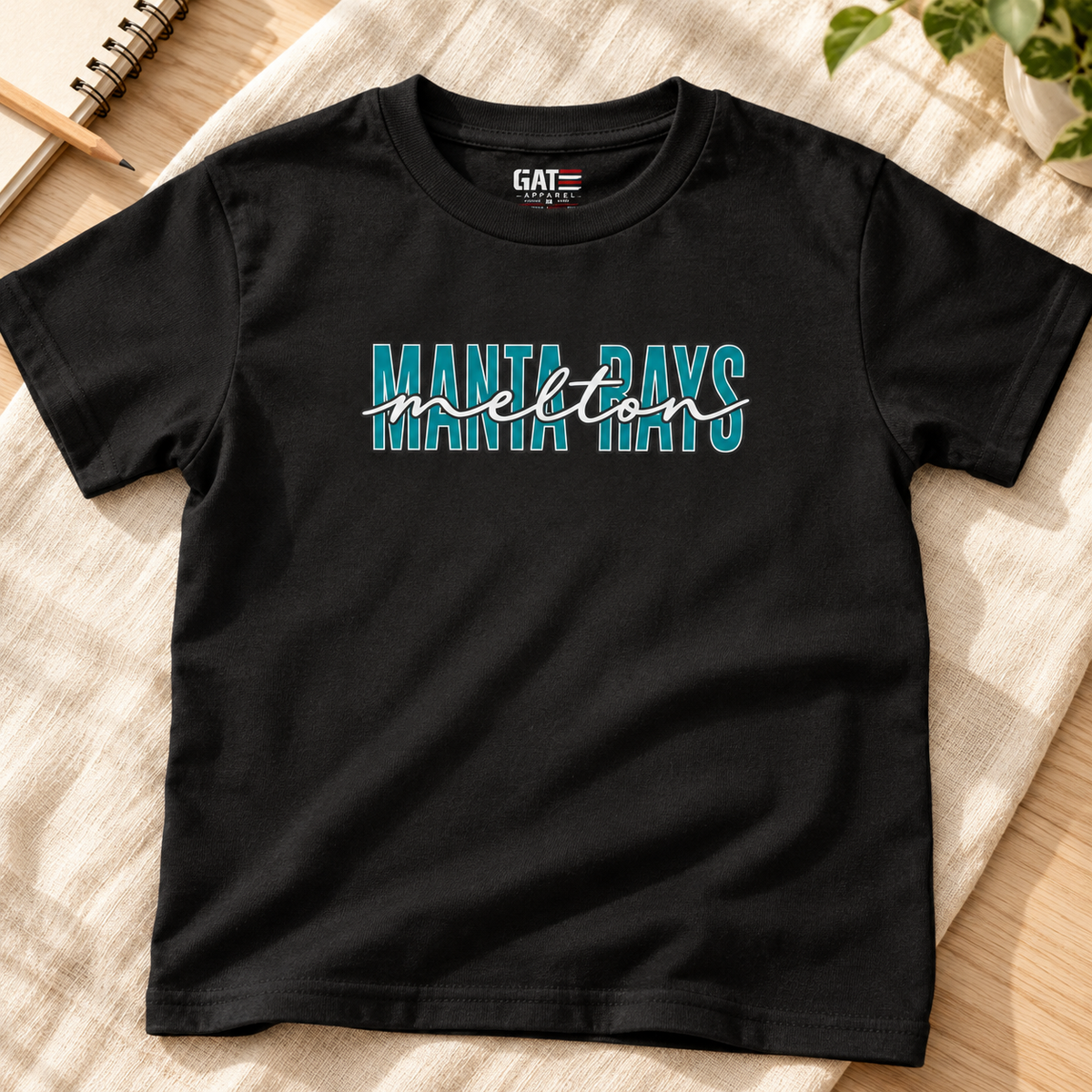 Melton Elementary Teal Script Kids Shirt | School Tee — layflat lifestyle mockup