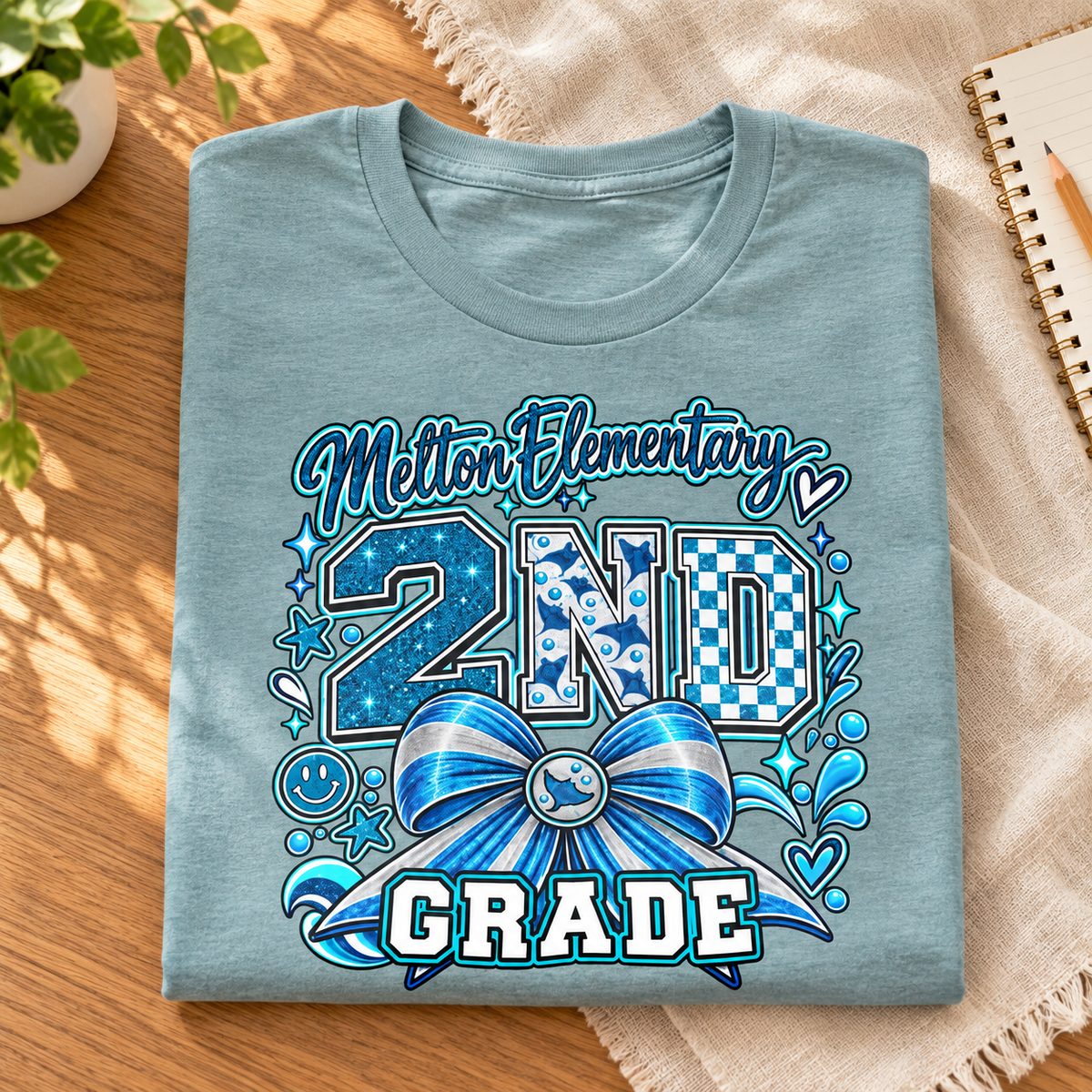 Melton 2nd Grade Bow Shirt | Elementary School Tee — folded lifestyle mockup