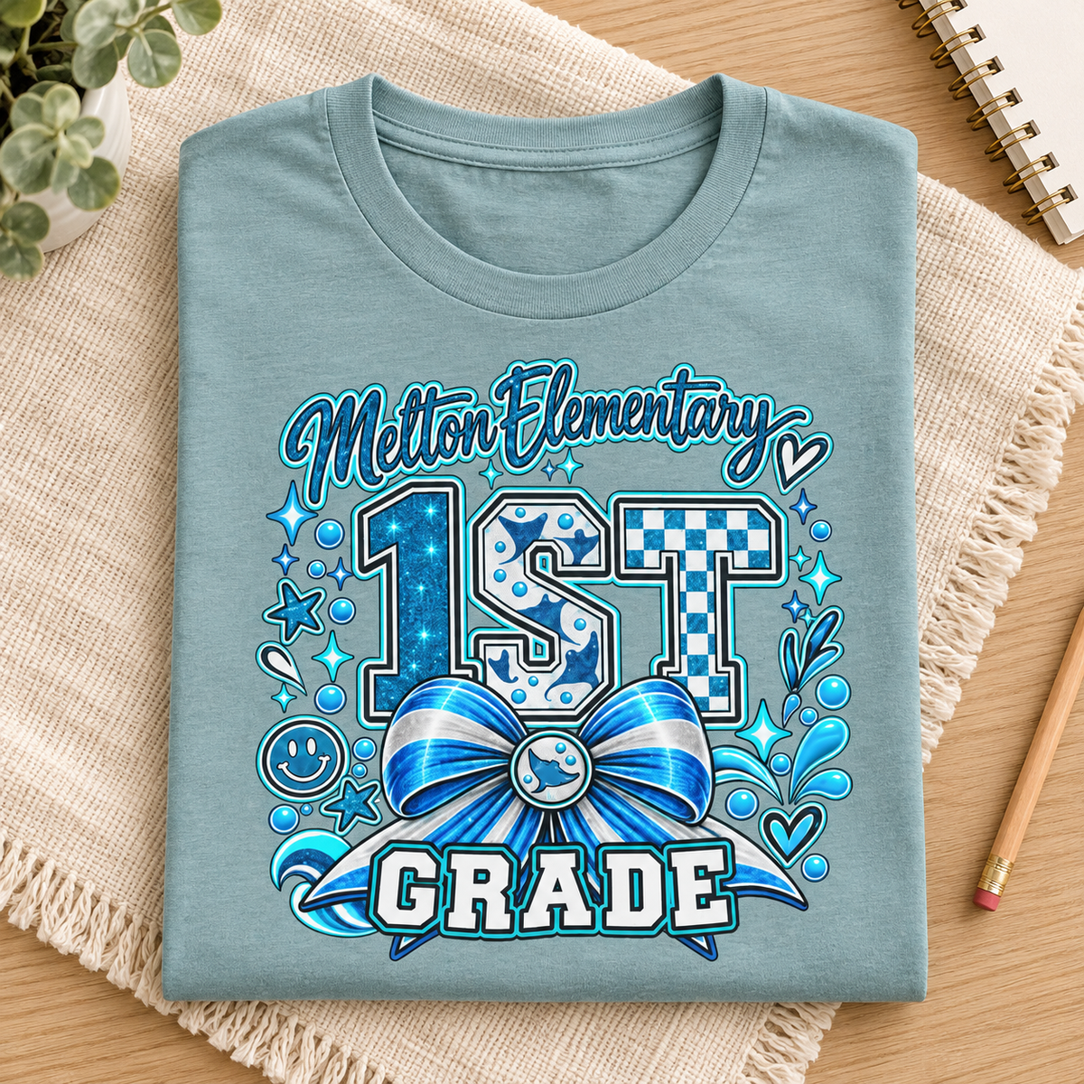 Melton 1st Grade Bow Shirt | Elementary School Tee — folded lifestyle mockup