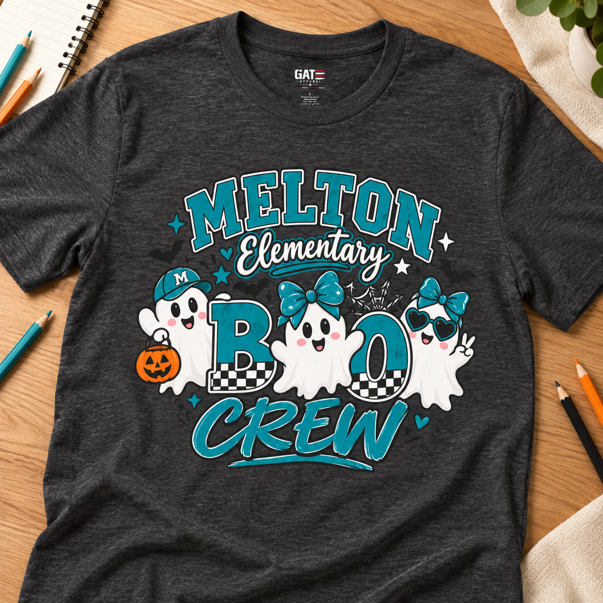 Melton Elementary Boo Crew Halloween T-Shirt — layflat lifestyle mockup