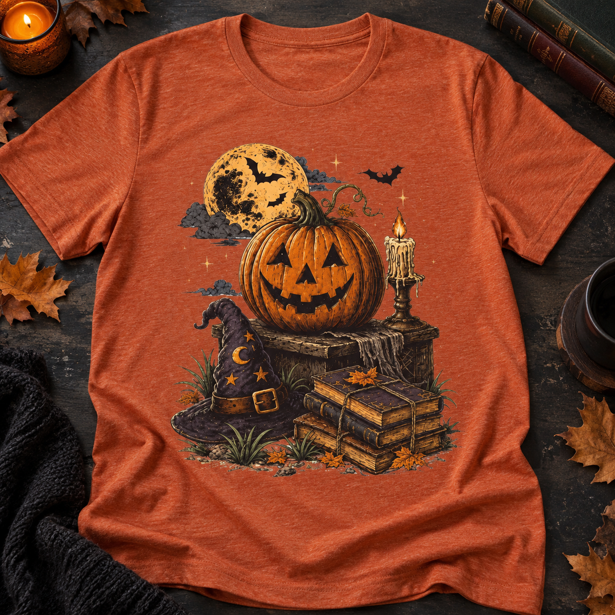 Halloween Pumpkin Stack Books & Moon T-Shirt — zoomed-in lifestyle flat lay