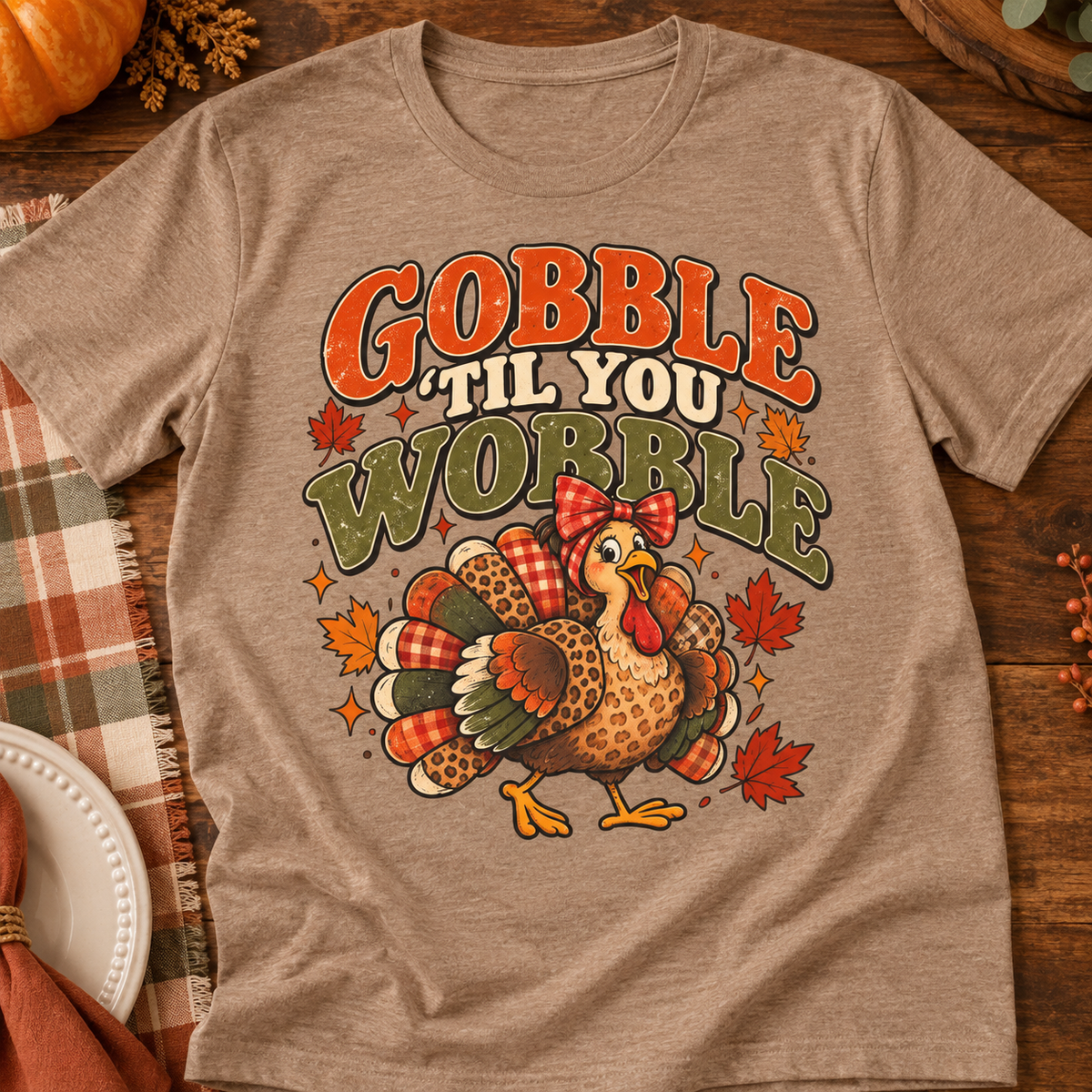 Gobble 'Til You Wobble Shirt | Thanksgiving Turkey Tee — zoomed-in lifestyle flat lay
