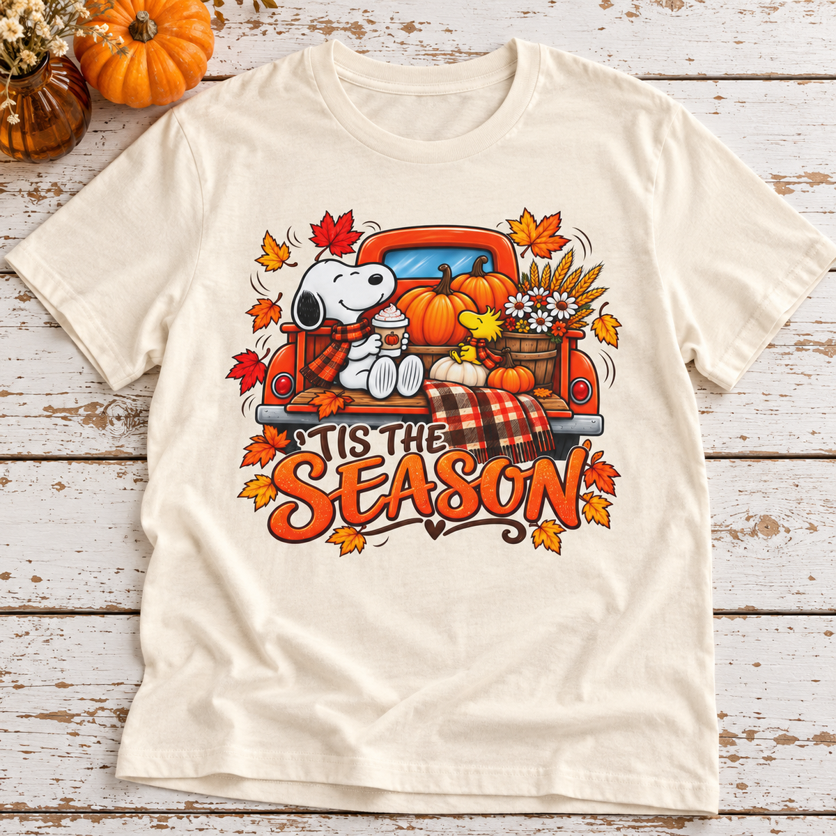 Snoopy Pumpkin Truck Fall T-Shirt | Tis the Season Autumn Graphic Tee — zoomed-in lifestyle flat lay