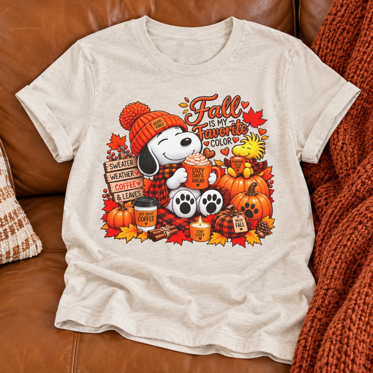 Snoopy Fall T-Shirt | Fall Is in the Air Pumpkin Autumn Graphic Tee — zoomed-in lifestyle flat lay