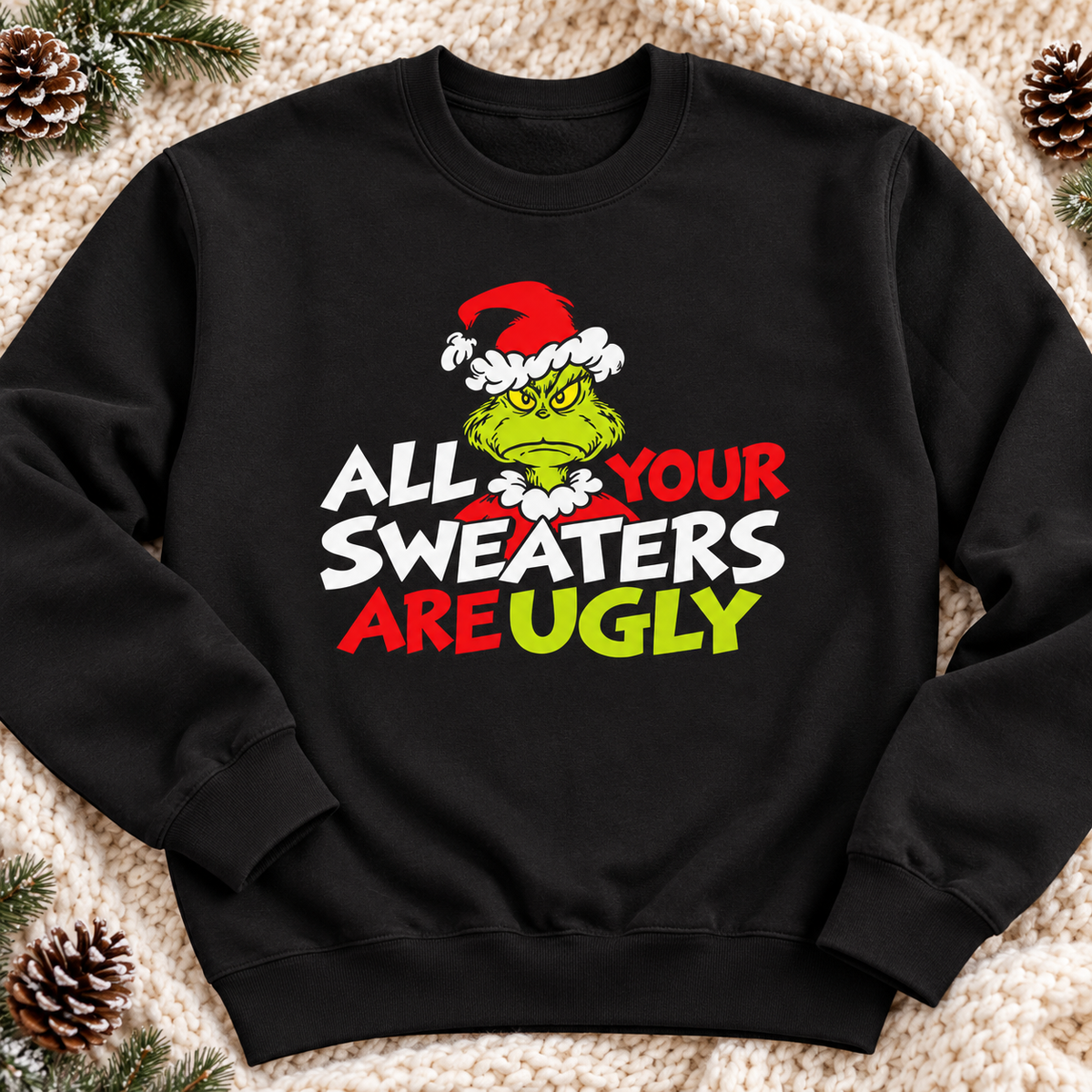 Grinch 'All Your Sweaters Are Ugly' Crewneck Sweatshirt — zoomed-in lifestyle flat lay