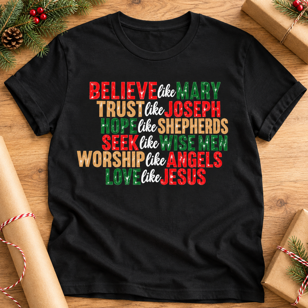 Believe Like Mary Christian Christmas T-Shirt — zoomed-in lifestyle flat lay