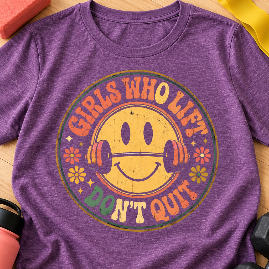 Girls Who Lift Don't Quit Gym Shirt | Retro Smiley Tee — close-up lifestyle flat lay