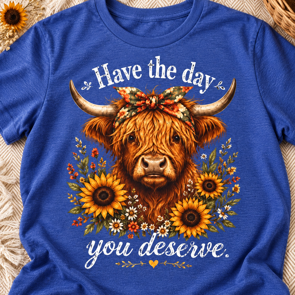 Have the Day You Deserve Highland Cow Shirt | Western Tee — close-up lifestyle flat lay