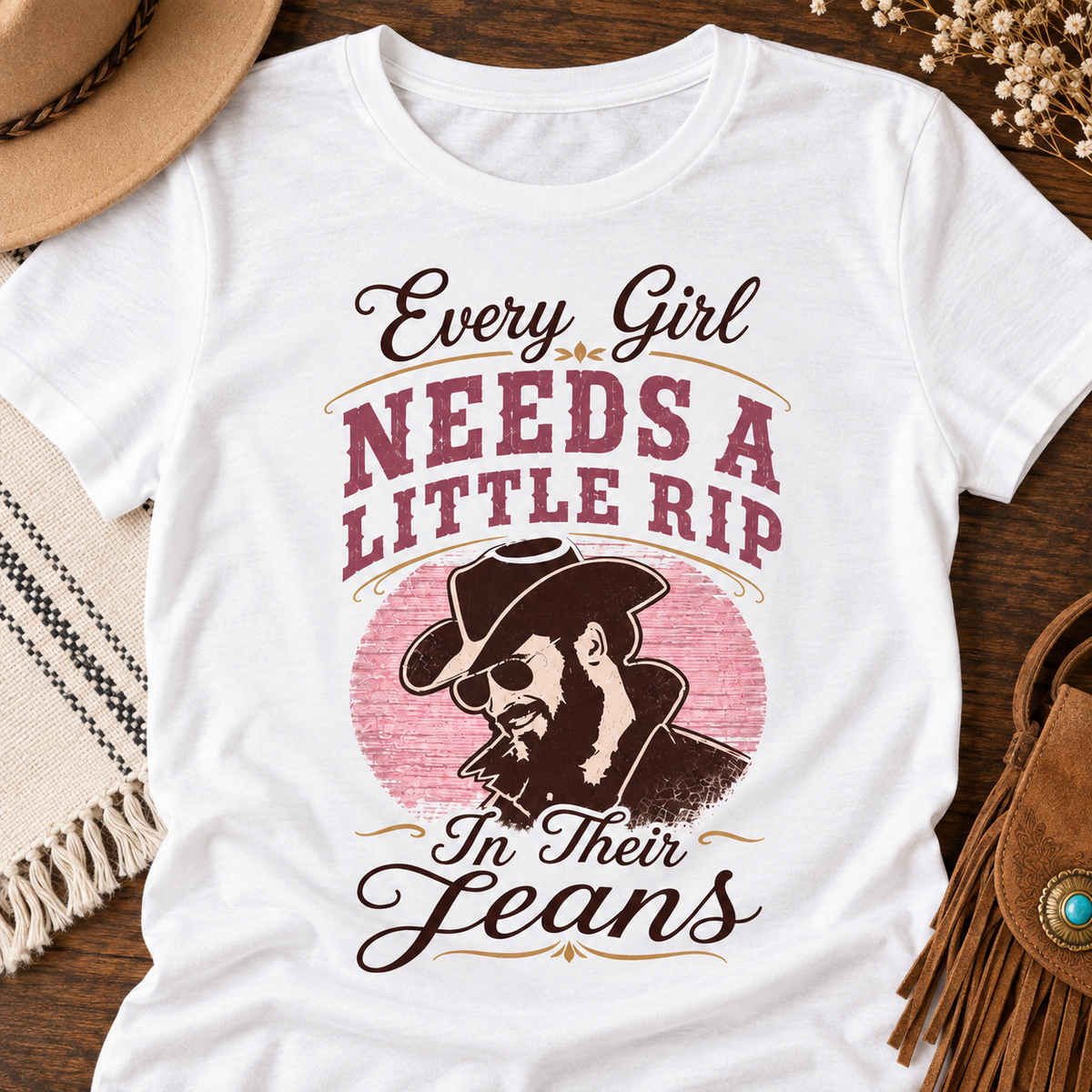 Every Girl Needs a Little Rip Pink Shirt | Western Cowgirl Tee — close-up lifestyle flat lay