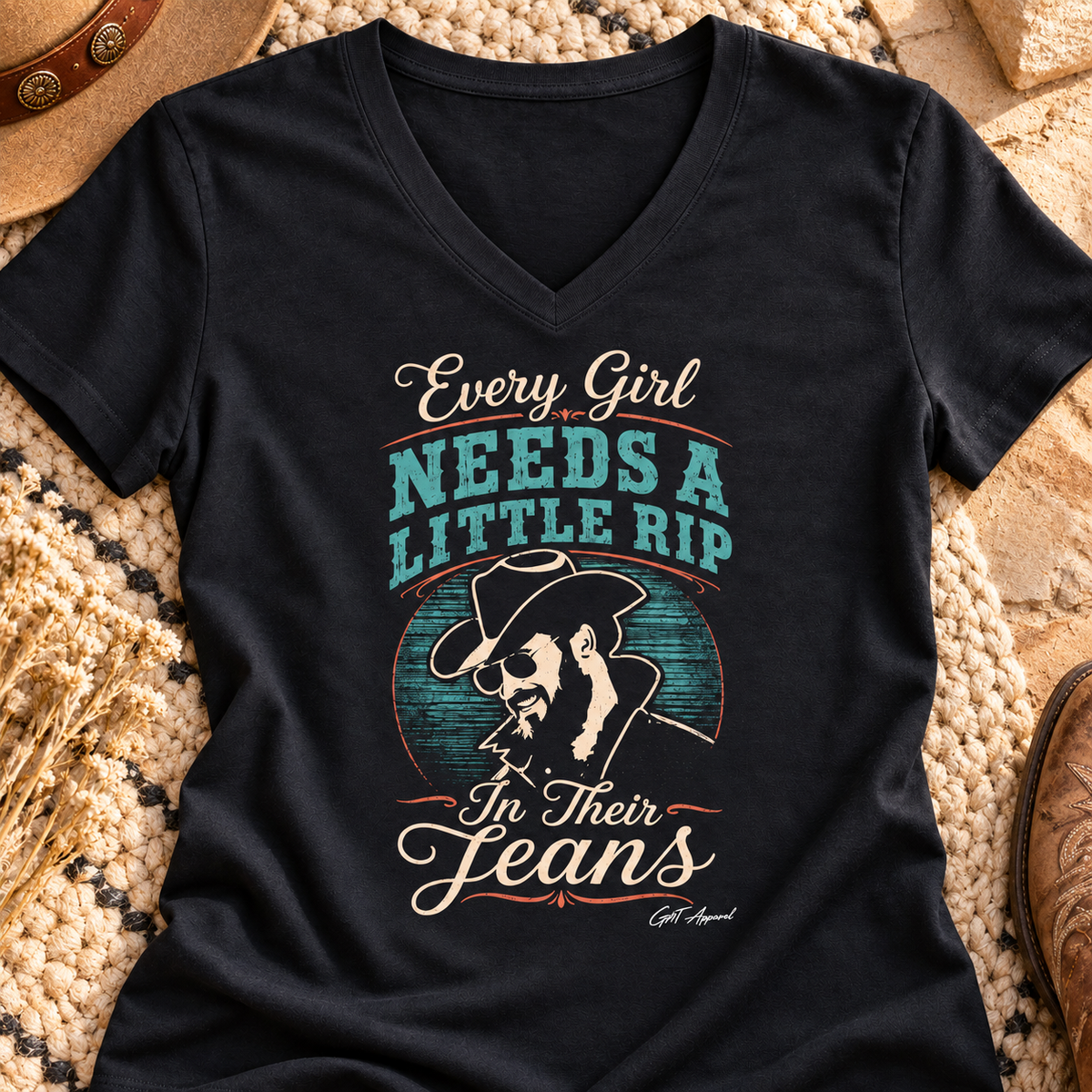 Every Girl Needs a Little Rip V-Neck Shirt | Western Cowgirl Tee — close-up lifestyle flat lay