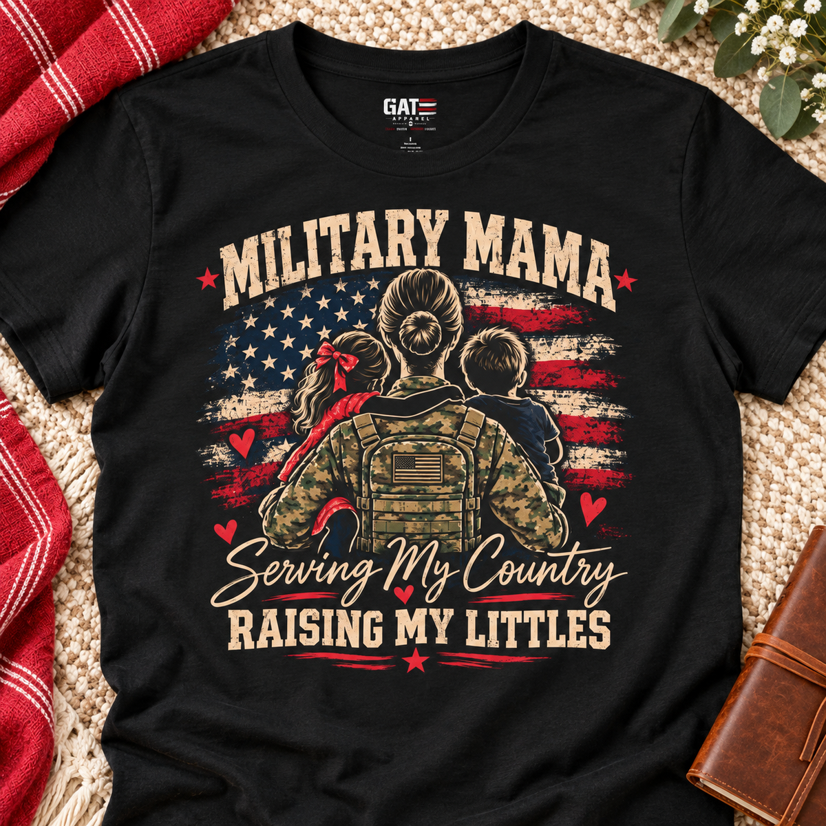 Military Mama T-Shirt – "Serving My Country, Raising My Littles" Patriotic Mom Tee — close-up lifestyle flat lay
