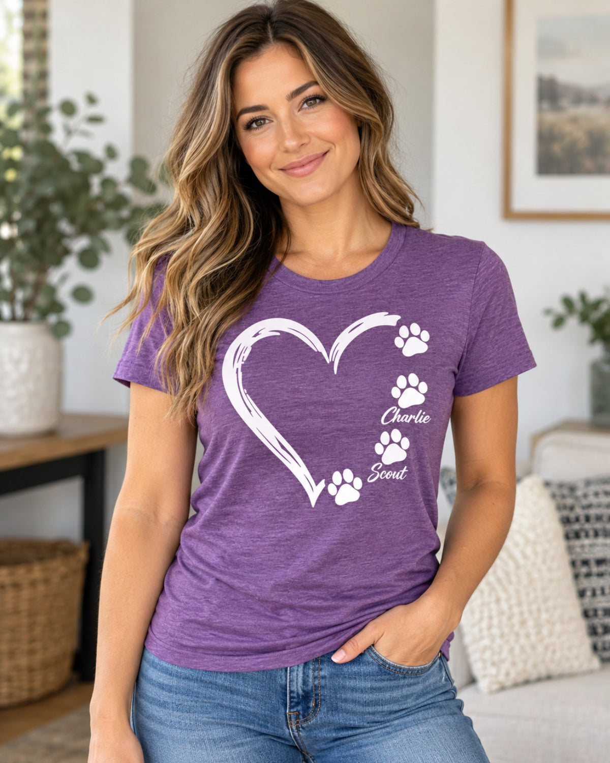 Woman wearing personalized paw heart T-shirt in heather purple